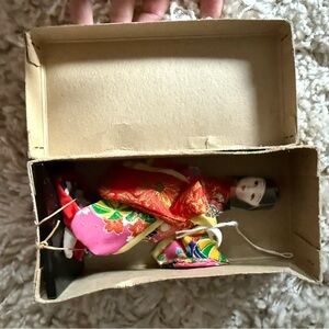 Traditional Japanese Doll in Red Kimono